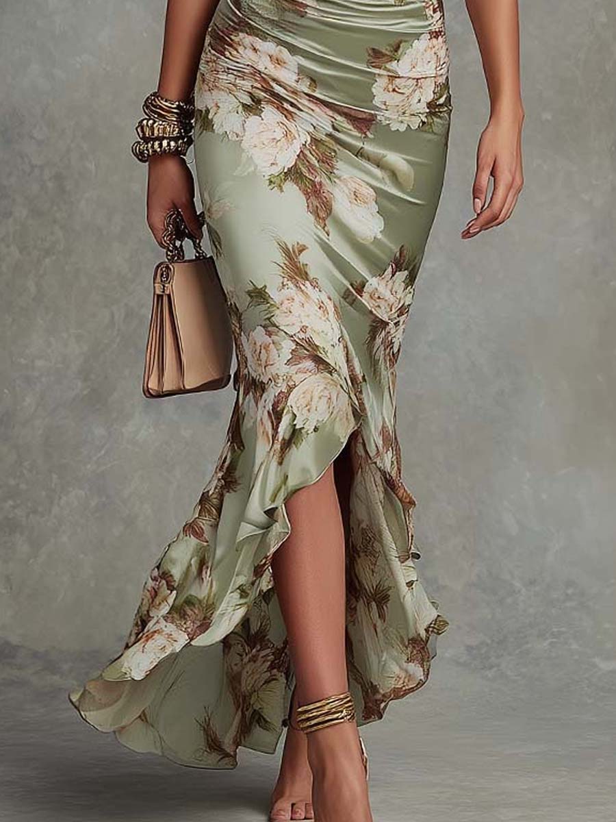 Anna | Asymmetrical long dress in green satin with V-neck, flared puff sleeves, and floral pattern