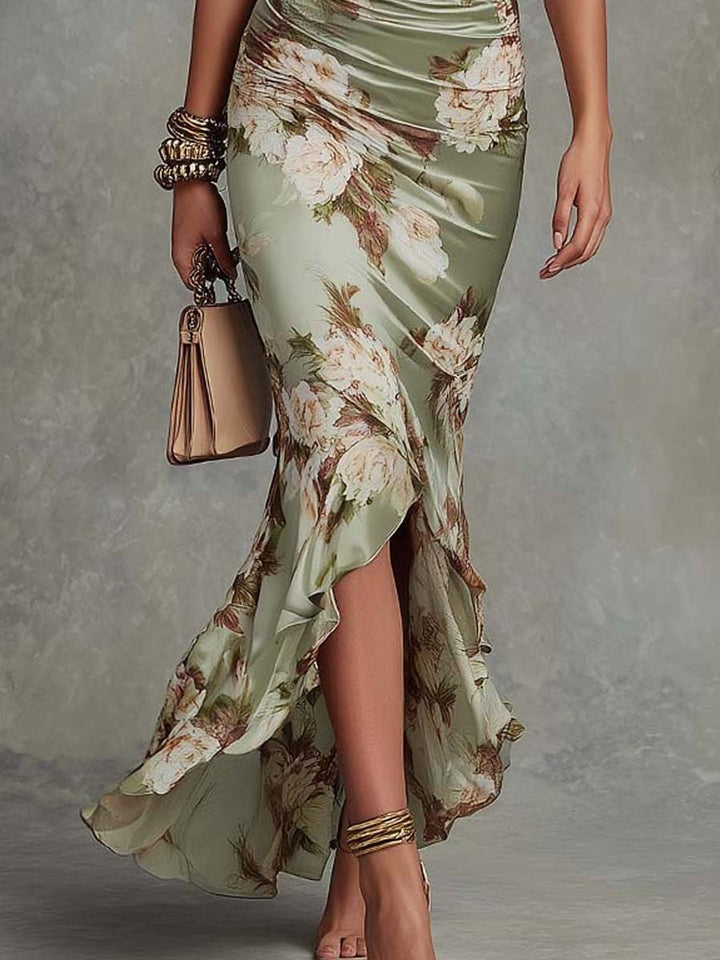 Anna | Asymmetrical long dress in green satin with V-neck, flared puff sleeves, and floral pattern